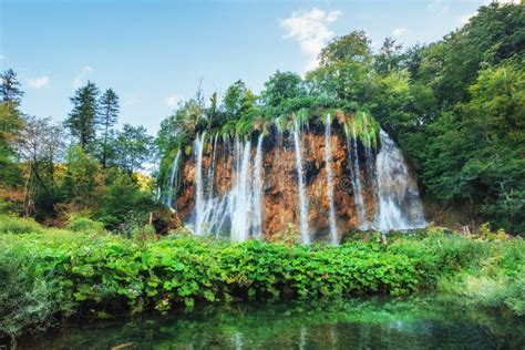 Waterfalls In National Park Falling Into Turquoise Lake Plitvice