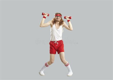 Funny Tired Skinny Man Doing Exercise With Gym Dumbbells Isolated On