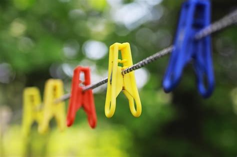premium photo clothespins on a clothesline in summer dry clothes outside clothes on a rope