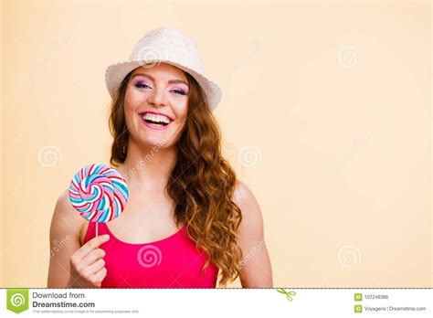 Woman Holds Colorful Lollipop Candy In Hand Stock Photo Image Of