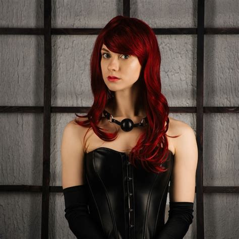 Premium Photo Portrait Of Red Haired Girl In A Leather Corset With