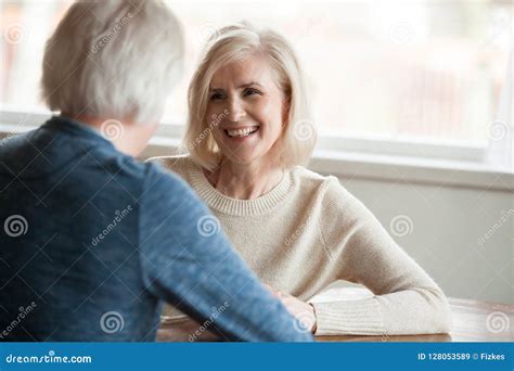 Smiling Mature Woman Listening To Man Talking Old Couple Dating Stock Image Image Of Health