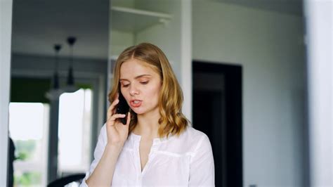 serious woman discussing on phone close up stock footage sbv 326289144 storyblocks