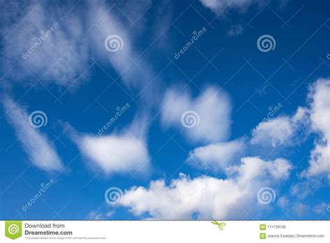 Deep Blue Skies And Fluffy Clouds Stock Photo Image Of Clear Cloudy