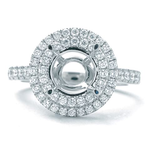 double halo round center diamond prong set setting in white gold new york jewelers chicago