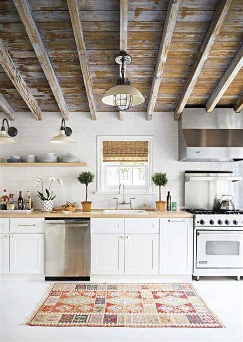 Painting the beams white makes them appear lighter and brightens the whole room. 36 Great Exposed Beam Ceiling Lighting Ideas | Home ...