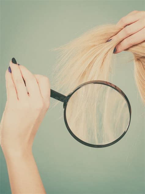 Woman Looking At Hair Through Magnifying Glass Stock Image Image Of