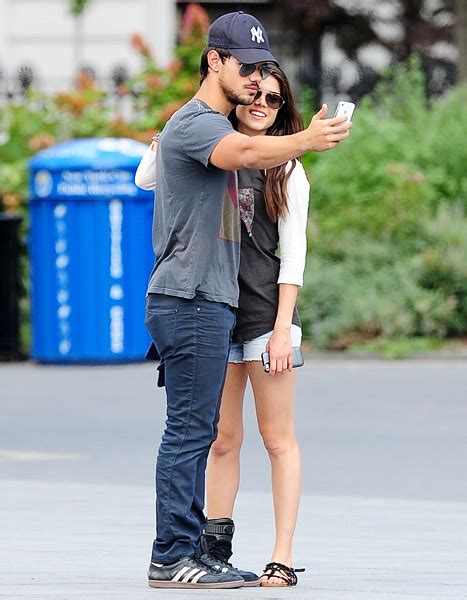 Taylor Lautner Marie Avgeropoulos Go Public And Hold Hands