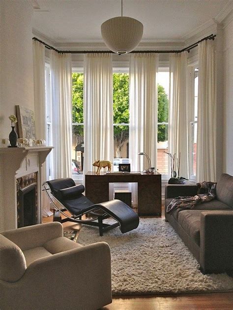Furnishing such a room requires choosing pieces that will work with, not against, the windows. The Wonderful Modern Bay Window Curtains Inspiration with ...