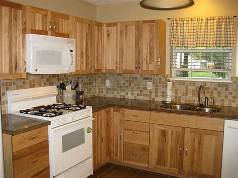 Knotty hickory is very rustic looking and it is perfect for log cabins, cottages, and other. choose right backsplash for hickory cabinets with dark ...