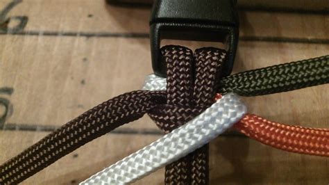 This bracelet is made with 550 paracord. How to Tie a 4 Strand Paracord Braid With a Core and Buckle. in 2021 | Paracord braids, Paracord ...