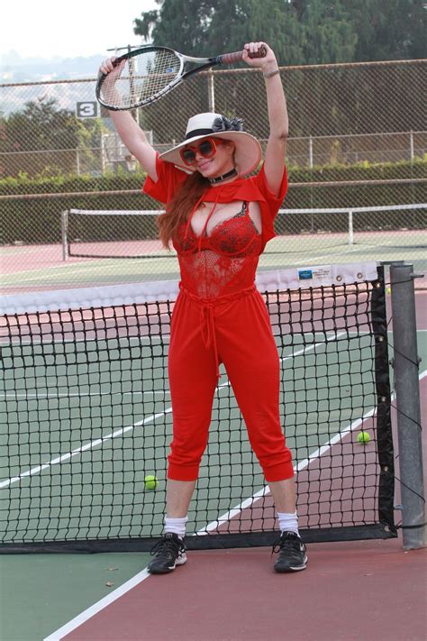 Choosing the best type of tennis court. PHOEBE PRICE at a Tennis Courts in Los Angeles 11/13/2020 ...
