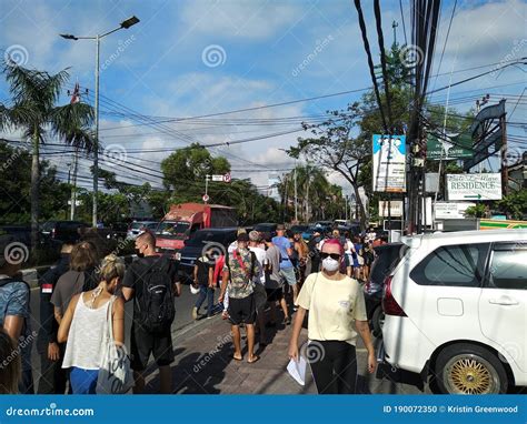Hundreds Of Tourists Lining Up Close Together At Bali Immigration