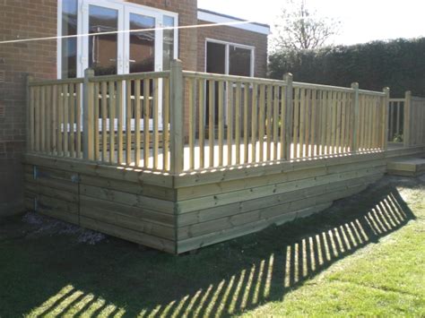 How many cubic feet of top/garden soil did you use to fill the bed? Sheffield Landscaper Gallery Patios Decking Ponds Fencing ...