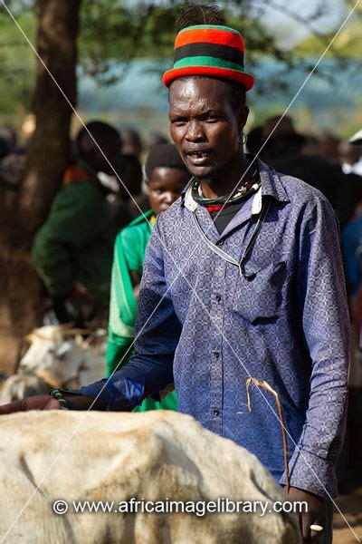 Photos And Pictures Of Karamojong Woman Selling Maize At The Moroto