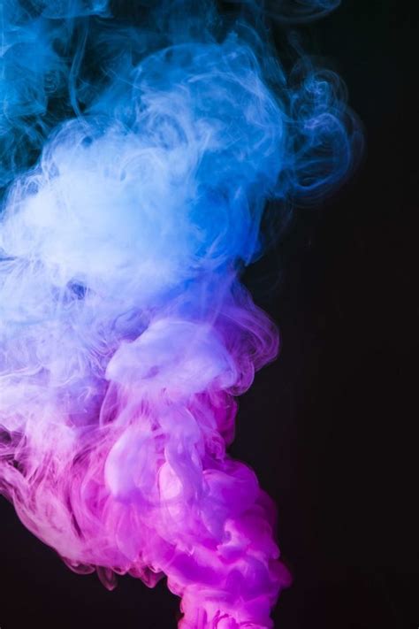 Abstract Blue And Pink Smoke Move On Black Color Background Black