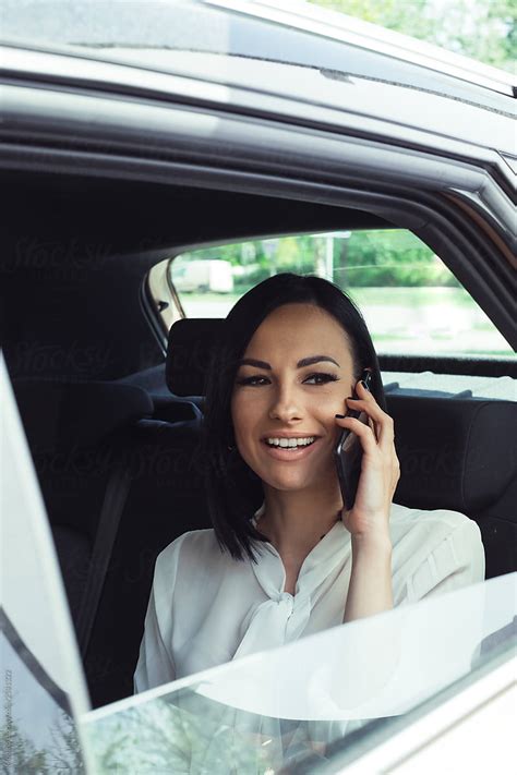 Modern Businesswoman In A Car Del Colaborador De Stocksy Mosuno Stocksy