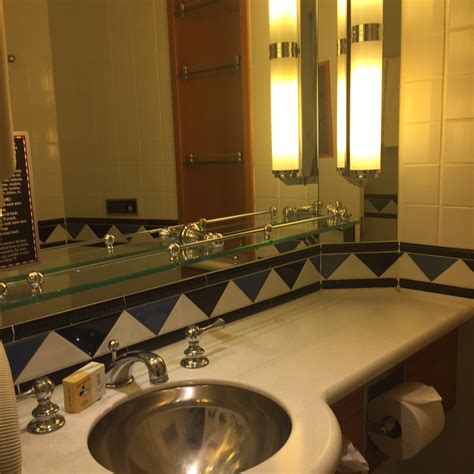 Cabins reflect an art deco style and nautical decor with disney touches. Cabin Category 4A, Disney Wonder
