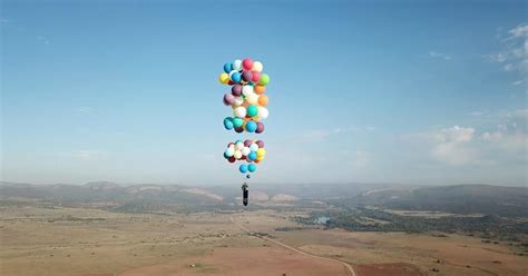 Man Strapped To 100 Helium Balloons Flies 8000 Feet Up In The Air