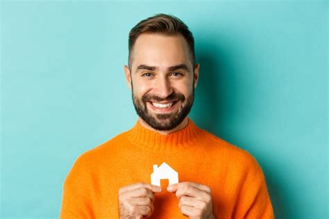 Free Photo Real Estate Concept Happy Young Man Searching For Home