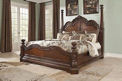 If your priority is storage, be sure to look at master bedroom sets that include bed storage with. Ashley Ledelle Old World Cherry Wood King Queen POSTER BED ...