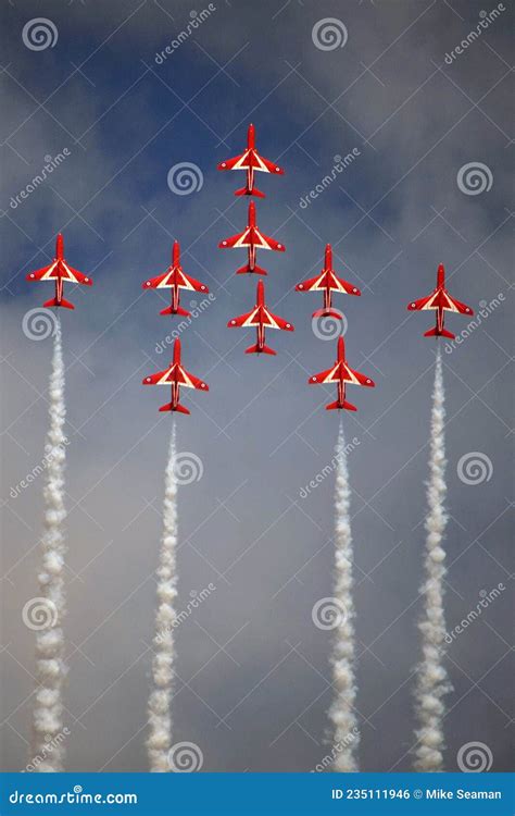 The Red Arrows Royal Air Force Aerobatic Team Flying In Formation