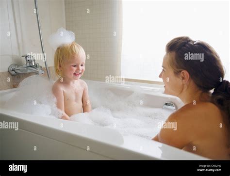 Mother And Baby Taking Bath Stock Photo Alamy