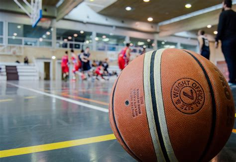 Brown Basketball on Grey Floor · Free Stock Photo