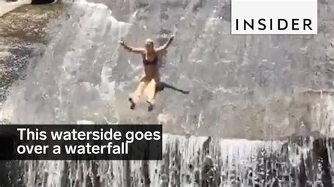 This Natural Rock Waterslide Sends Riders Over A 20 Foot Waterfall Youtube
