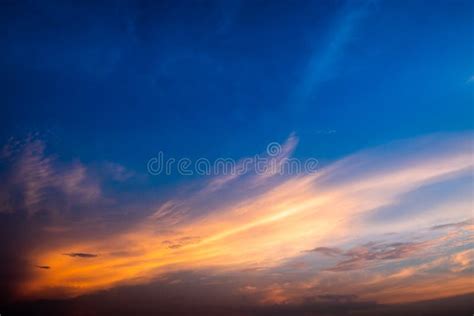 Twilight Clear Blue Sky With Dramatic Orange Sunlight In Diagonal