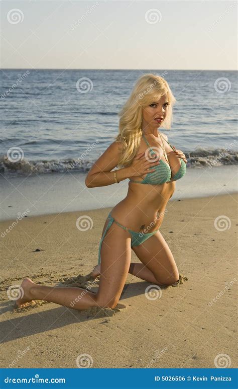 Blond Woman Holding Her Breasts On The Beach Stock Photo Image Of