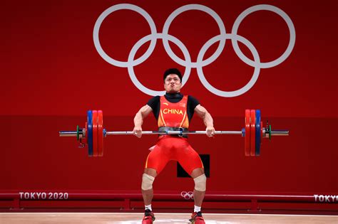 Weightlifting Chinas Li Wins Gold In Mens 61kg Reuters