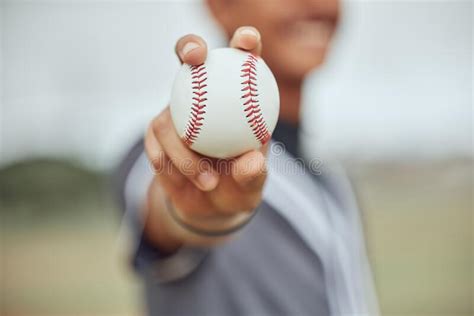 Athlete With Baseball In Hand Man Holding Ball On Outdoor Sports Field