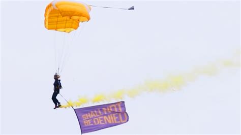 Female Skydivers Honor The 100th Anniversary Of Womens Right To Vote