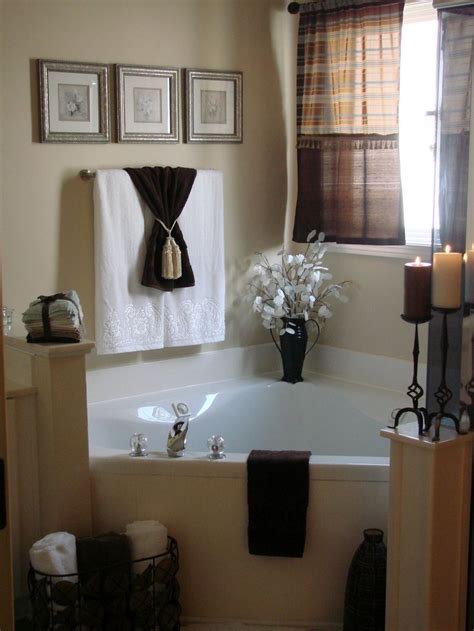 Enhance your bathroom style with fun and vibrant bath towels! Bathroom+008.jpg (image) | Bathtub decor, Bathroom staging ...