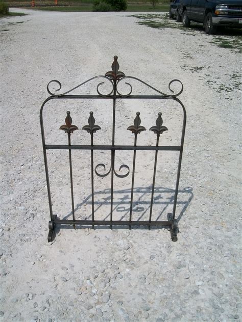 Usually garden trellis are made of varied types of metal like aluminum, iron, steel, brass wrought iron trellises can be used to create a vertical garden, providing shade and privacy, and putting the garden plants on show. 35" Wrought Iron Garden Gate Trellis - Screen