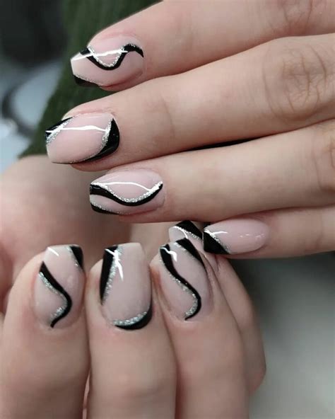 Dazzling Black And Silver Nails For A Sophisticated Edge Nail