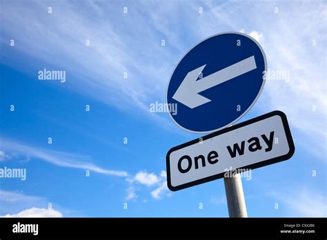 Road Sign One Way Traffic Against Blue Sky Roads Sign Uk Stock Photo