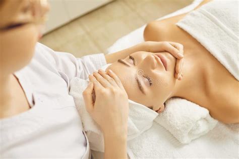 Facial Massage To A Beautiful Girl In A Beauty Clinic Stock Image Image Of Masseuse Girl