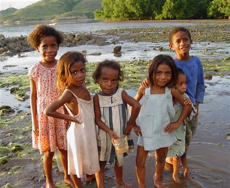 The People Of East Timor Children On Tidal Flats