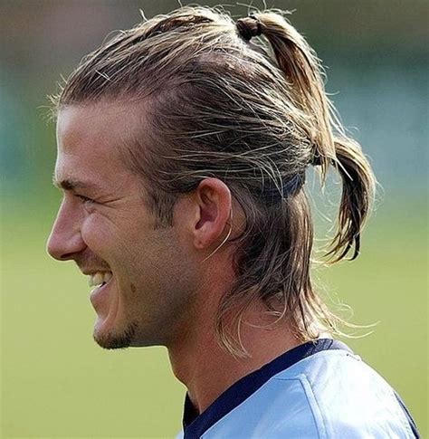 David beckham s hair is straight out of 2003 gq. David Beckham hair styles: Double ponytail hairstyle pictures