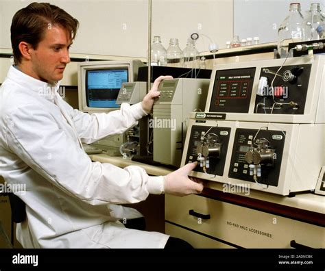 High Performance Liquid Chromatography Male Technician Operating High