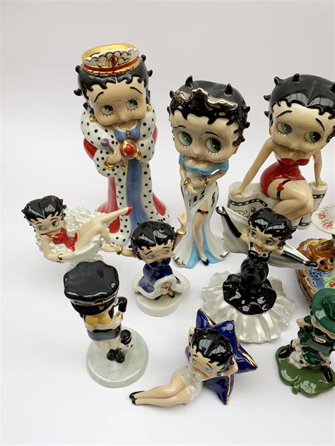 A Collection Of Nineteen Wade Betty Boop Figures Comprising Premier