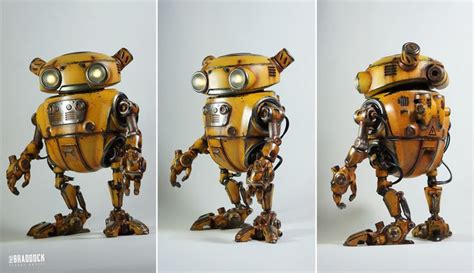 Three Different Views Of A Yellow Robot