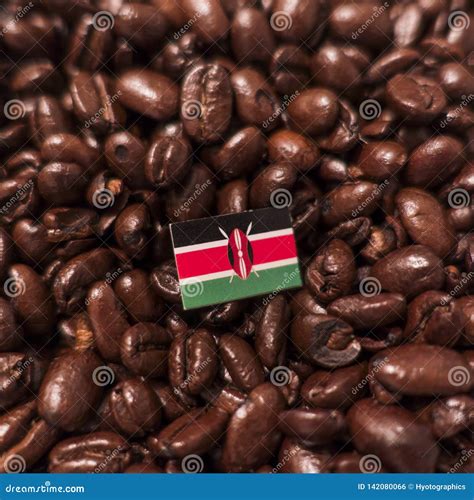 A Kenya Flag Placed Over Roasted Coffee Beans Stock Photo Image Of