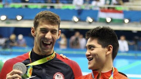 Singapore's wunderkind swimmer, joseph schooling, wasn't always on the fast track to glory. Photo of Joseph Schooling And Michael Phelps Captures ...
