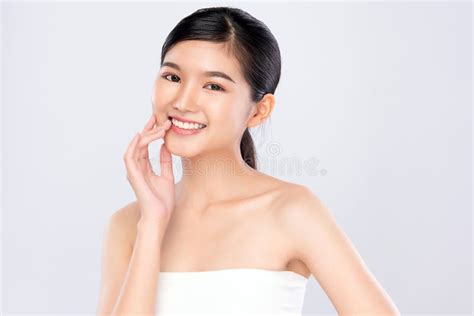 Beauty Face Smiling Asian Woman Touching Healthy Skin Portrait Stock