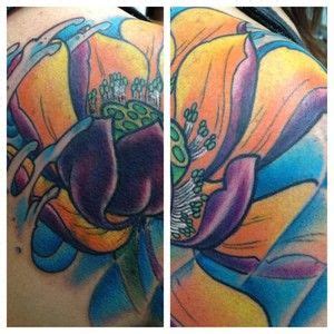 Maybe you would like to learn more about one of these? Full color lotus shoulder cap tattoo by Rob Daughaday at ...