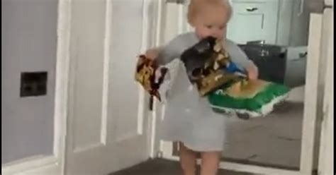 Tot Goes Viral After Mum Catches Her Raiding Snack Cupboards In