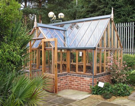 A Gabriel Ash Traditional Victorian Style Timber Greenhouse With Dwarf